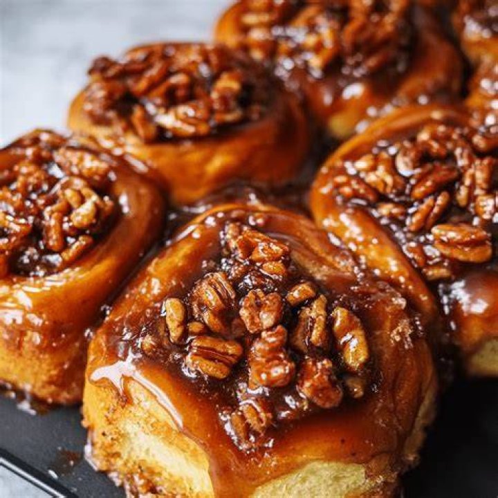 Sticky buns on a white plate.