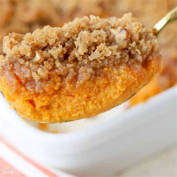 Sweet potato souffle in a white baking dish
