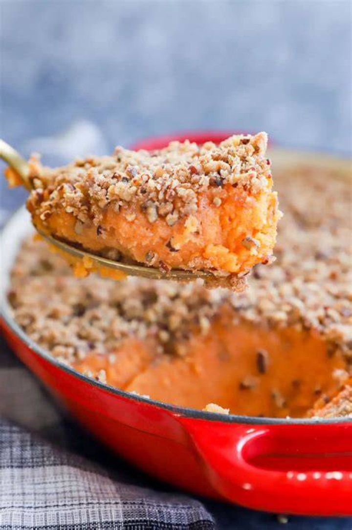 Sweet potato souffle on a large spoon
