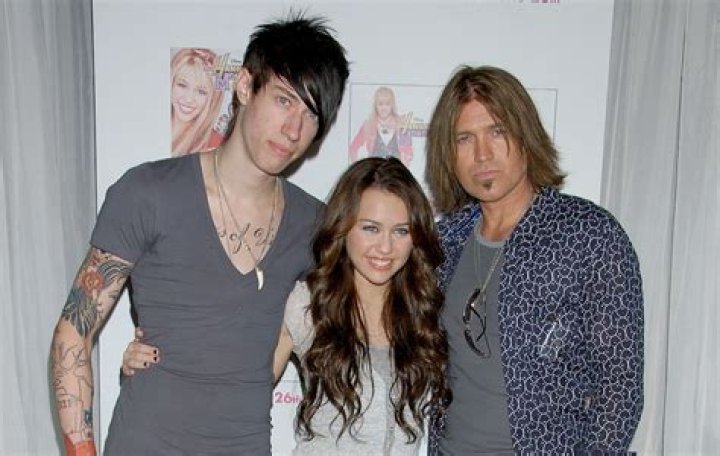 Young Trace Cyrus with Miley Cyrus